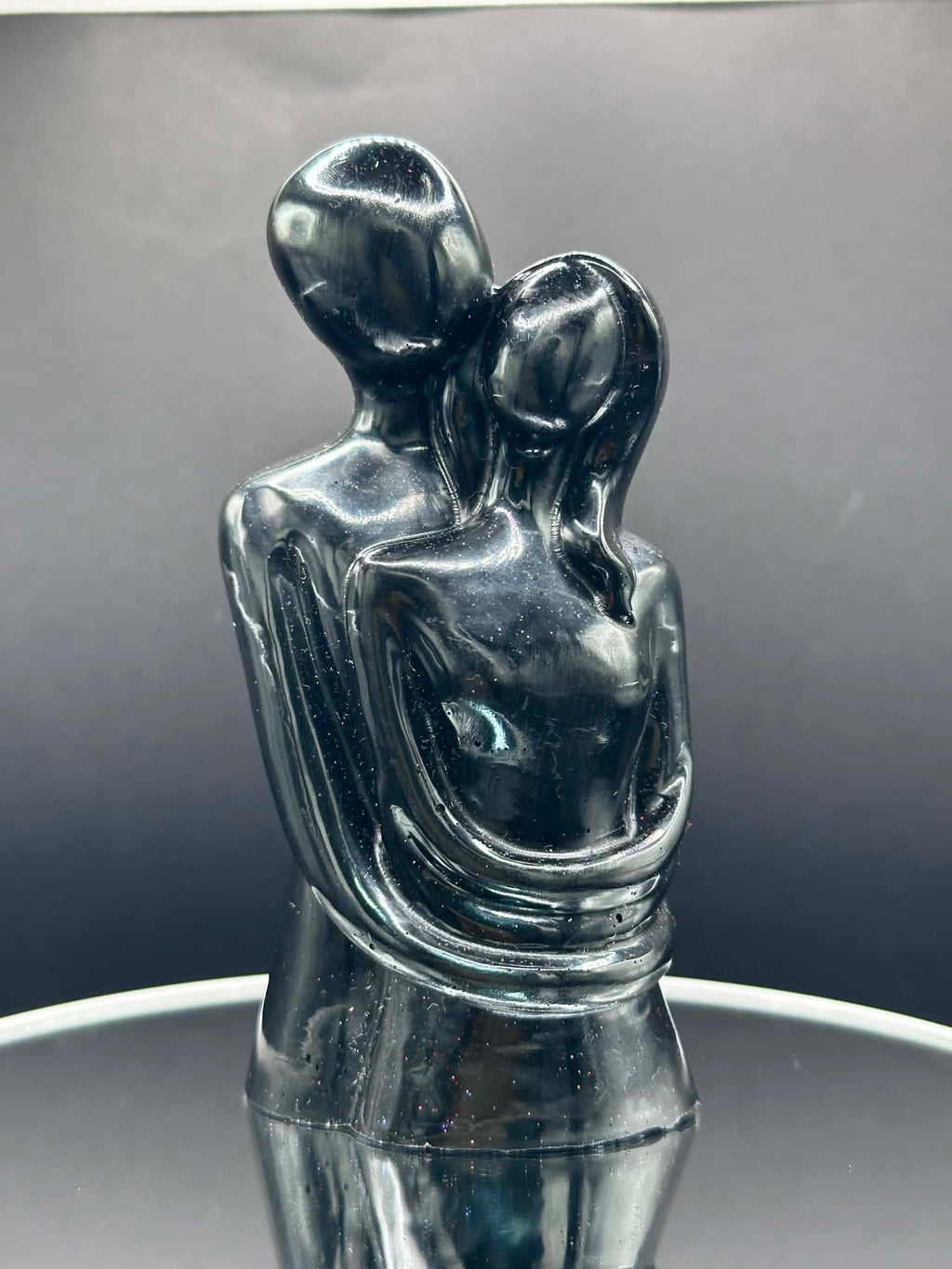 Man and Woman Embrace Figurine in Black