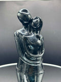 Man and Woman Embrace Figurine in Black