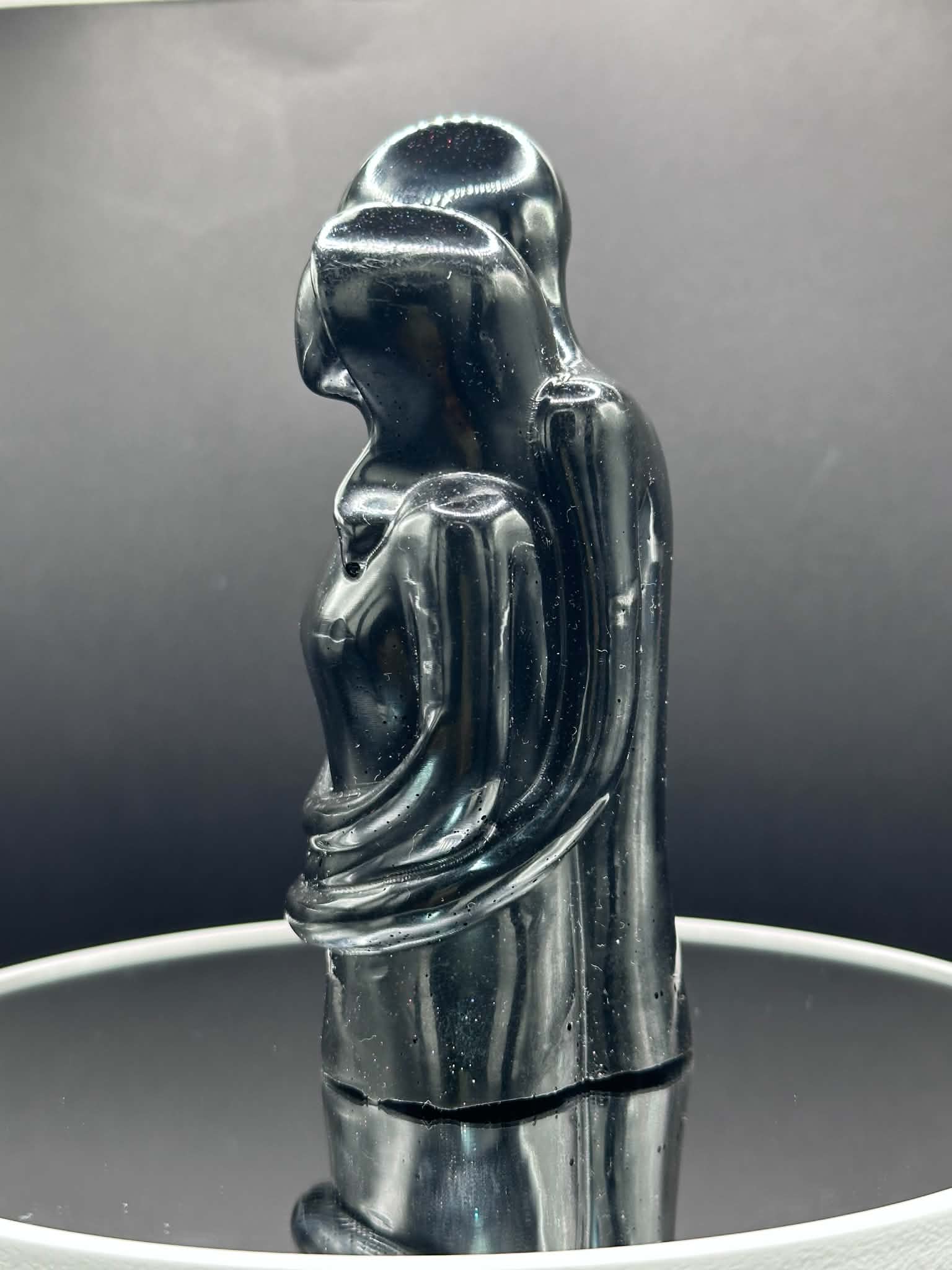Man and Woman Embrace Figurine in Black