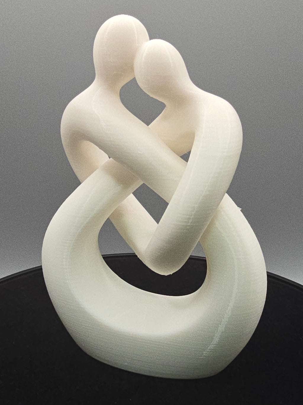 Intertwined Man And Woman In White