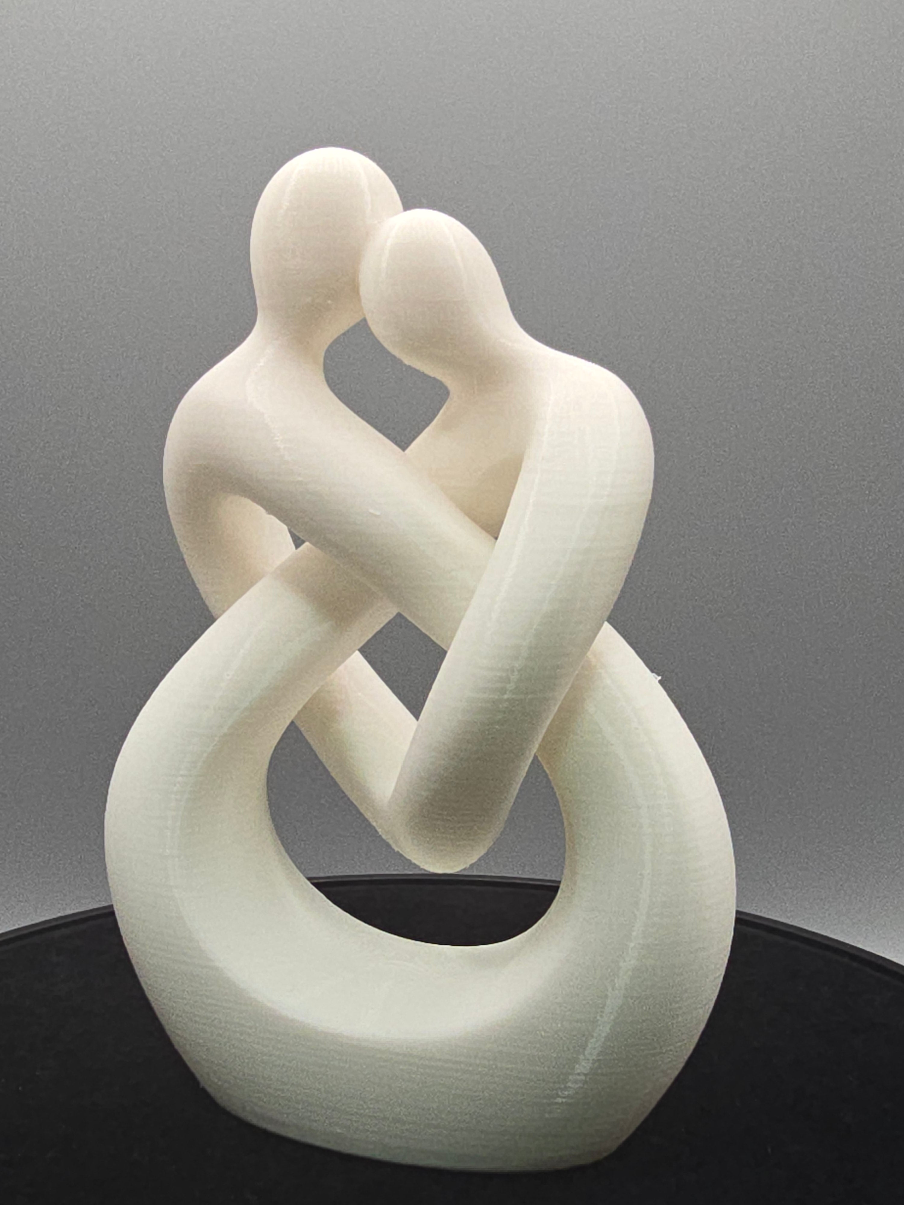Intertwined Man And Woman In White