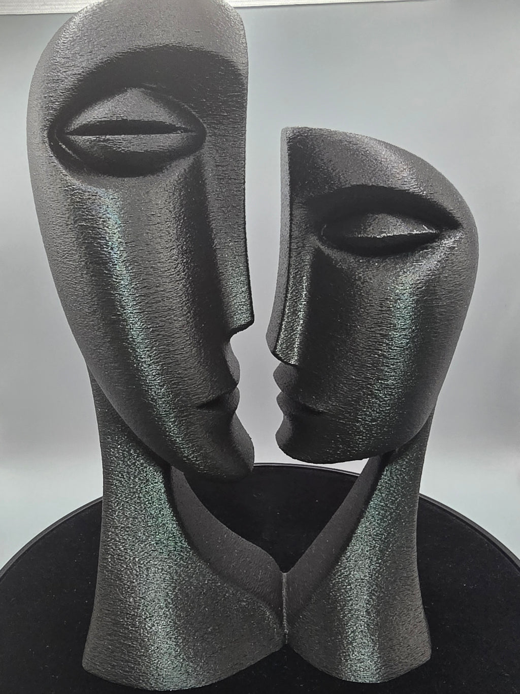 Man And Woman Bust In Black