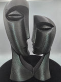 Man And Woman Bust In Black