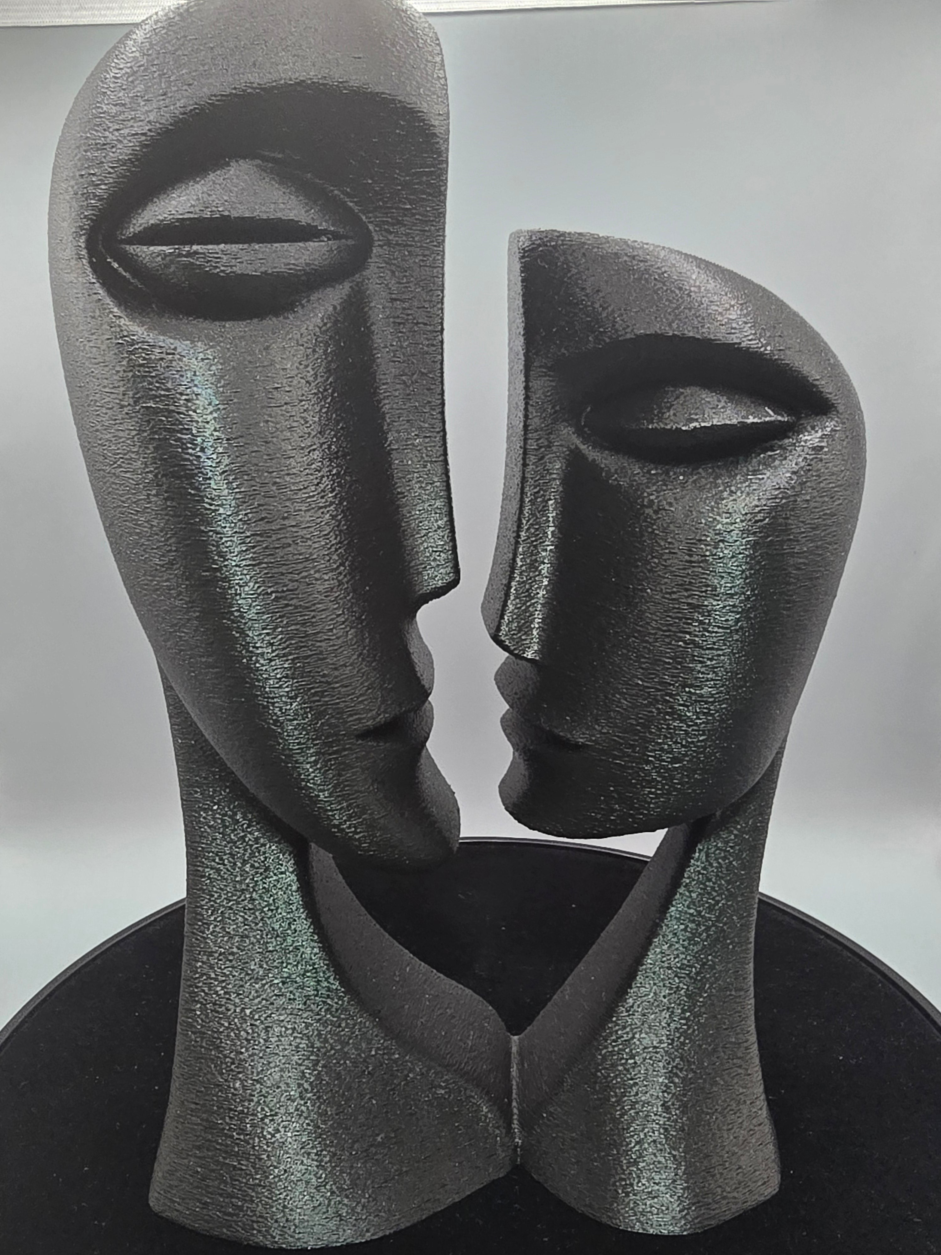 Man And Woman Bust In Black