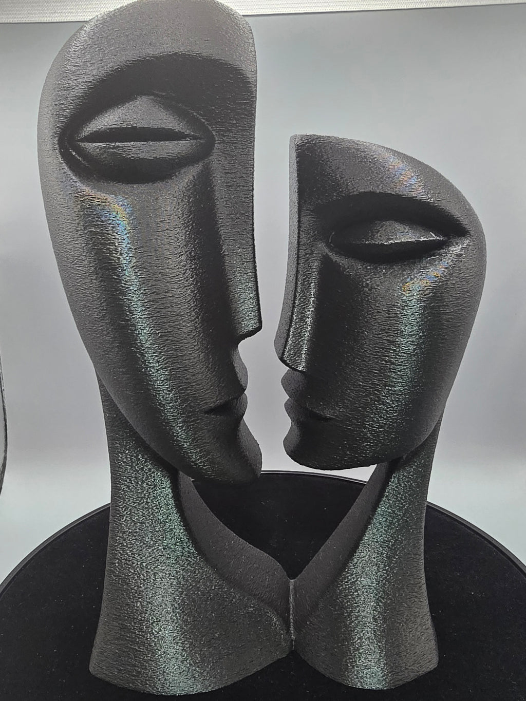 Man And Woman Bust In Black