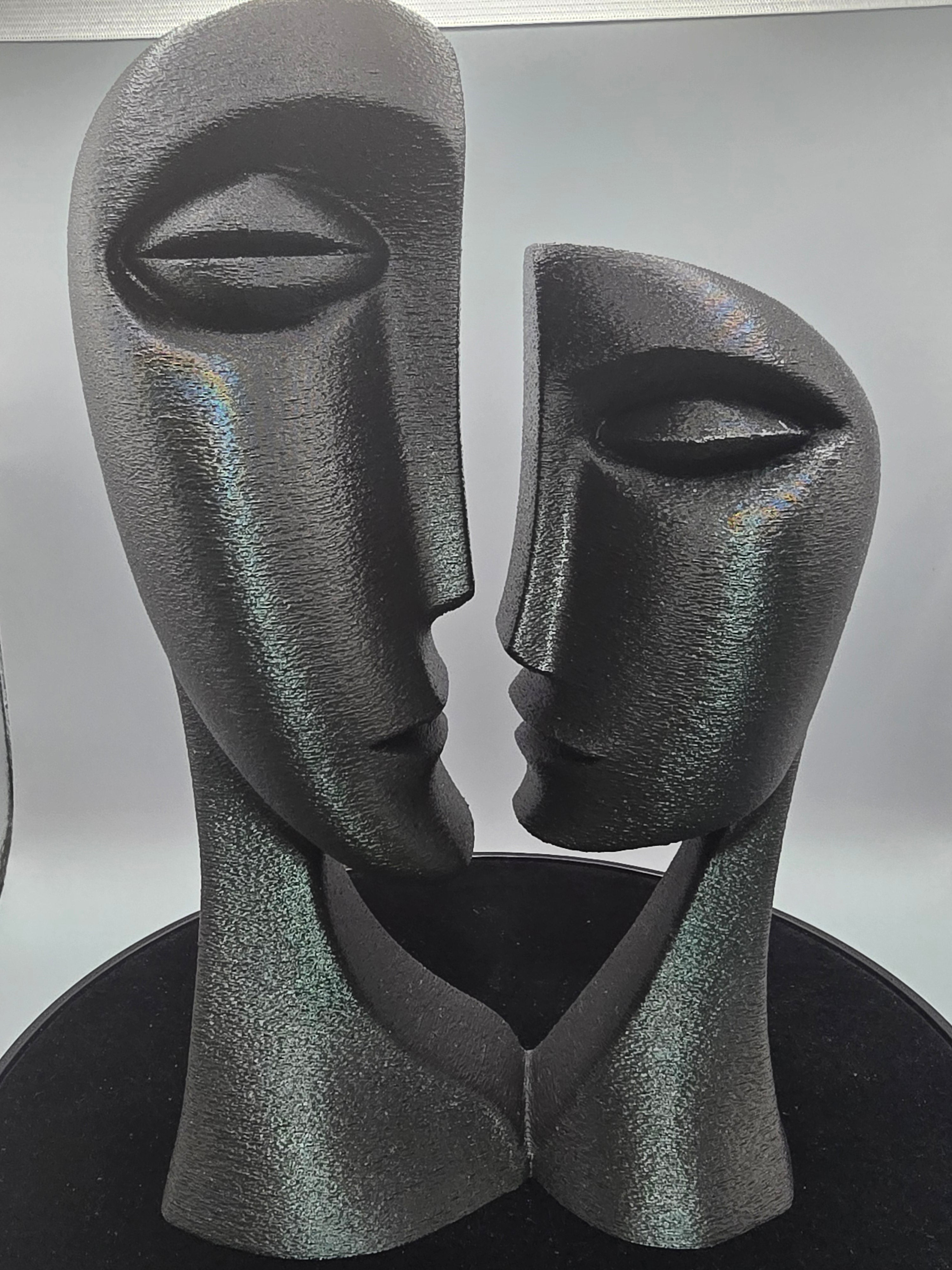 Man And Woman Bust In Black